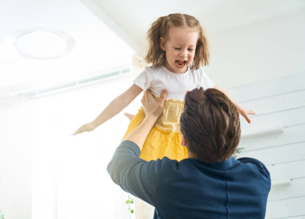 istock child is playing with parent 1152439711