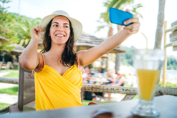 istock Young woman making selfies on vacation 1152440351