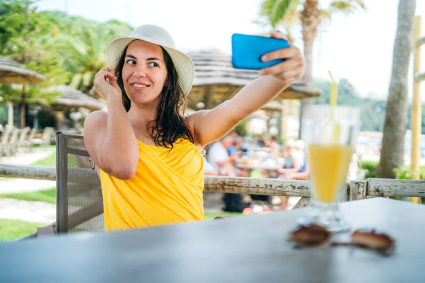 istock Young woman making selfies on vacation 1152440427