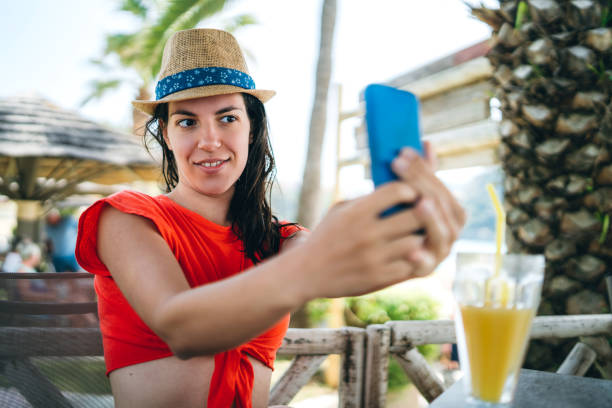 istock Young woman making selfies on vacation 1152441002