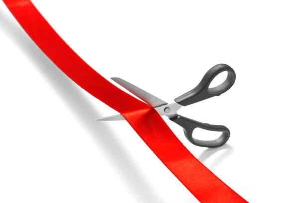 istock Red Ribbon Cutting Ceremony 1152441600