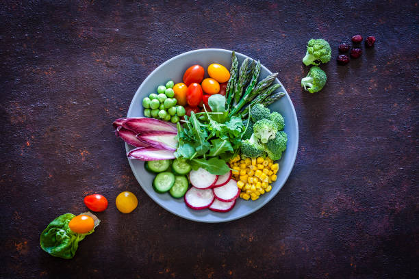 istock Vegan food: healthy fresh vegetables salad shot from above 1152442031