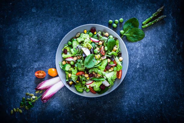 istock Vegan food: healthy fresh vegetables salad shot from above 1152442033