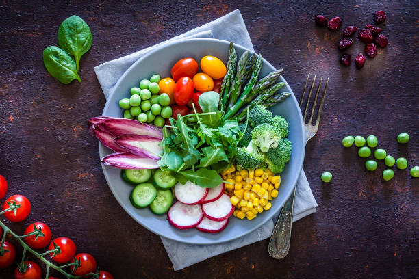 istock Healthy fresh vegetables salad plate shot from above 1152442162