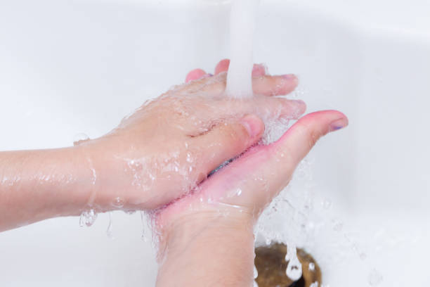 istock washing children's hands with soap after drawing 1152447432