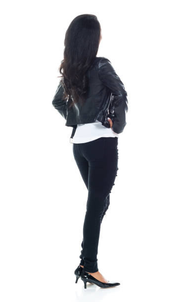 istock Beautiful Latino female wearing a leather jacket - hands on hips 1152449648