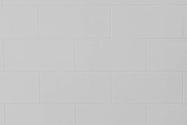 istock Close up of modern white block brick wall or floor texture background. 1152450999