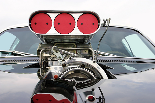 Blower on the mask of classic muscle car