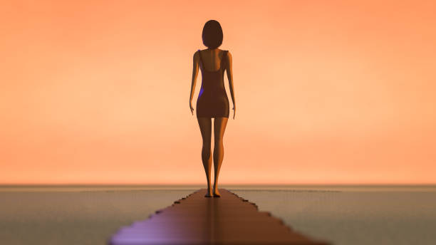 istock A woman walks along a long walkway 1152451123