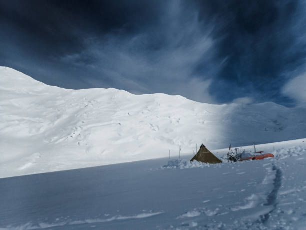 istock Camping in the mountains. Winter expedition 1152451201