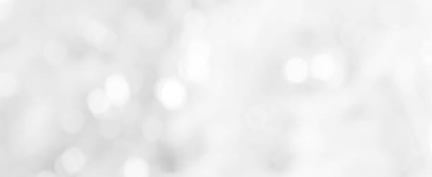Abstract blurred soft white silver beautiful with glitter bokeh round light panoramic background for design banner  and presentation concept stock photo