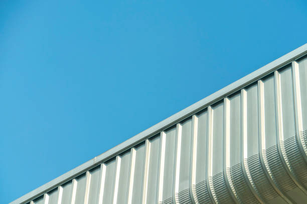 istock Building of wall on blue sky background 1152458246