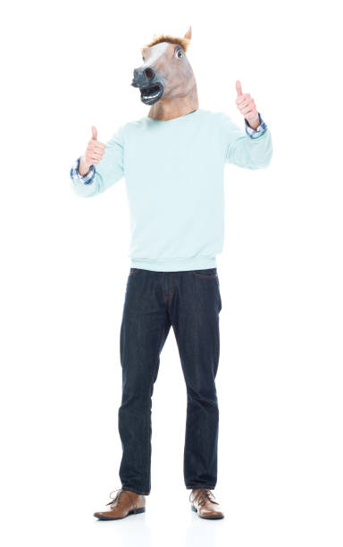 istock Man with horse mask showing thumbs up 1152462527