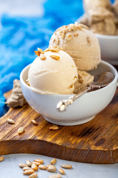 istock Ice cream with seeds and halva in a white bowl. 1152465384