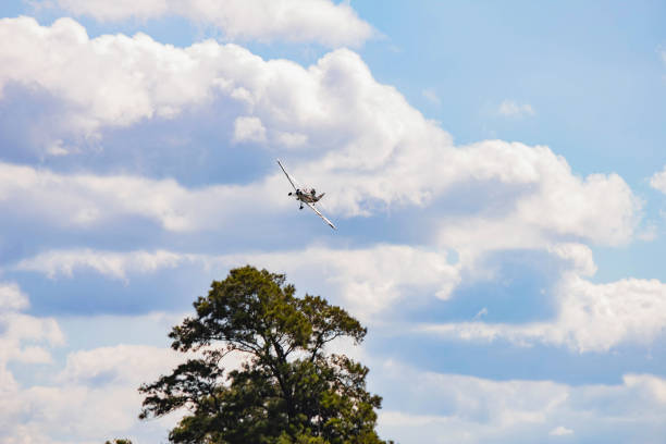 istock airplane, field, farming skies, field spraying, 1152467177