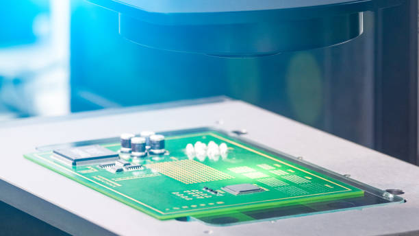 istock manufacture of chips on a printed circuit board under a microscope 1152469070