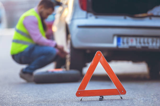 istock accident with a tire on the road 1152471275