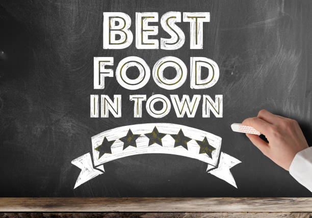 text BEST FOOD IN TOWN written on chalkboard