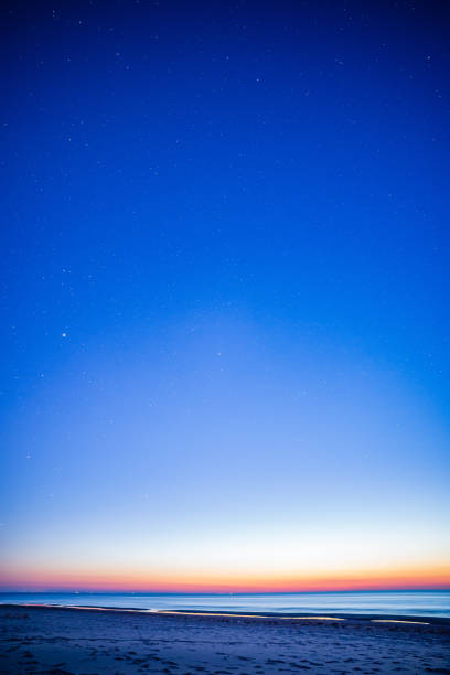 istock night sky with stars and clouds in long exposure shot 1152474466
