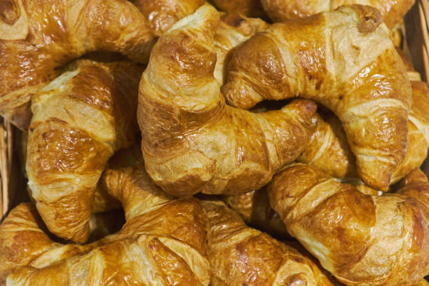 istock Fresh lush croissants handmade. Banquet table. Catering 1152476331