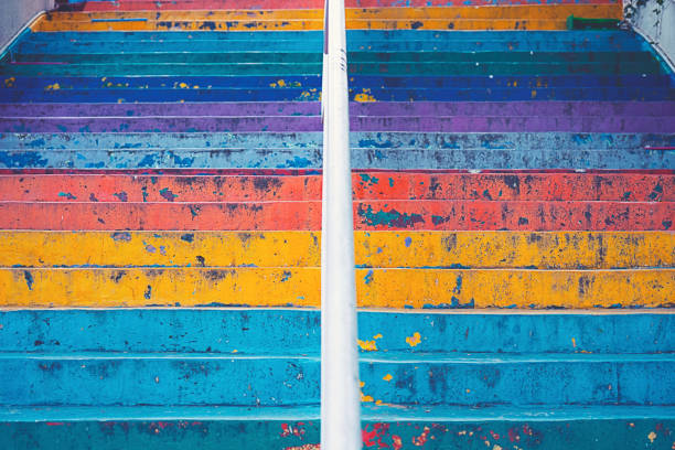 Stairs painted in rainbow colors background