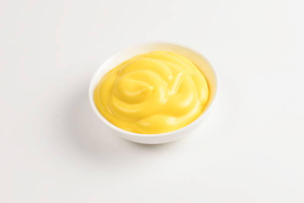 istock Cheese sauce in white plate on white background. 1152481408