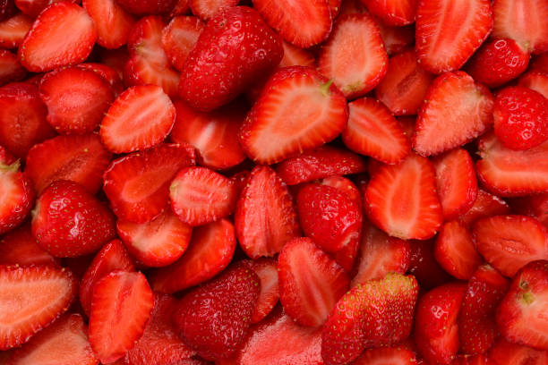 istock Strawberry slices. Fresh berries macro. Fruit background. Top view. 1152481412
