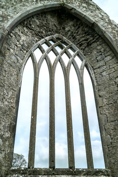 istock Gothic window frame in a ruined abbey 1152484739