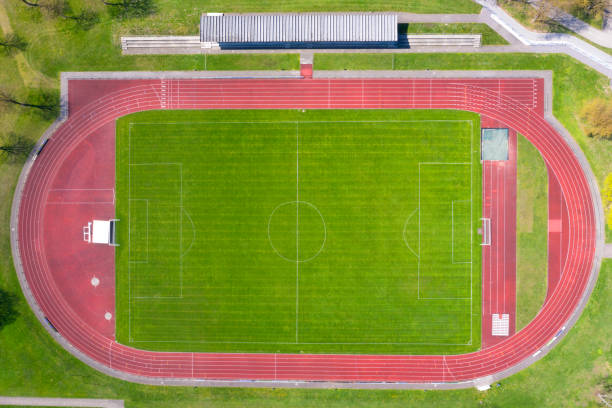 Sports Stadium Viewed from Above Aerial view of sports stadium. track and field stadium stock pictures, royalty-free photos & images
