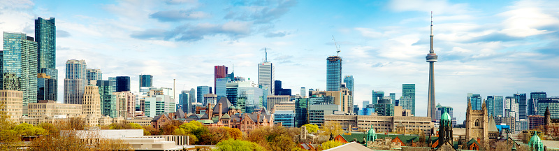 Toronto financial district skyline panorama on a partially cloudy Springtime afternoon