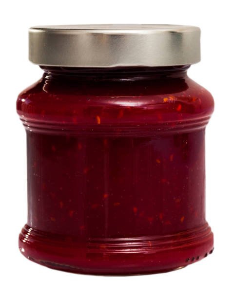 istock Closed glass jar of raspberry jam 1152487419