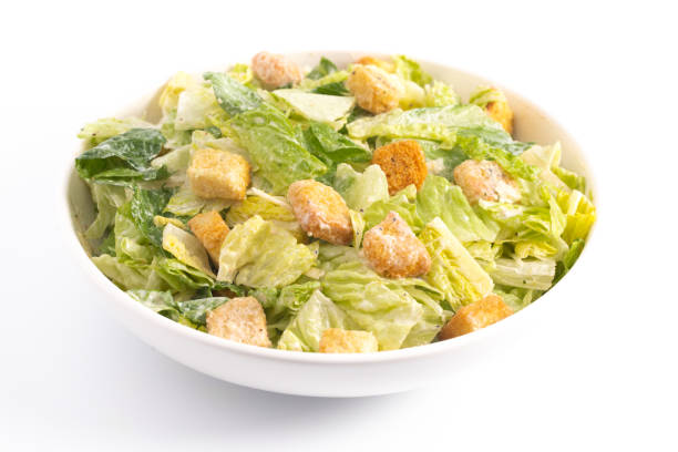Fresh Caesar Salad Isolated on a White Background stock photo