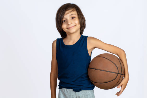 istock Little boy with basket ball. 1152498816