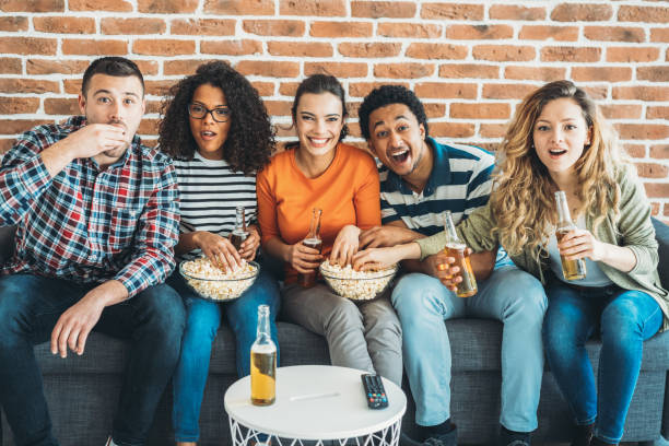istock Group of friends watching tv 1152498859