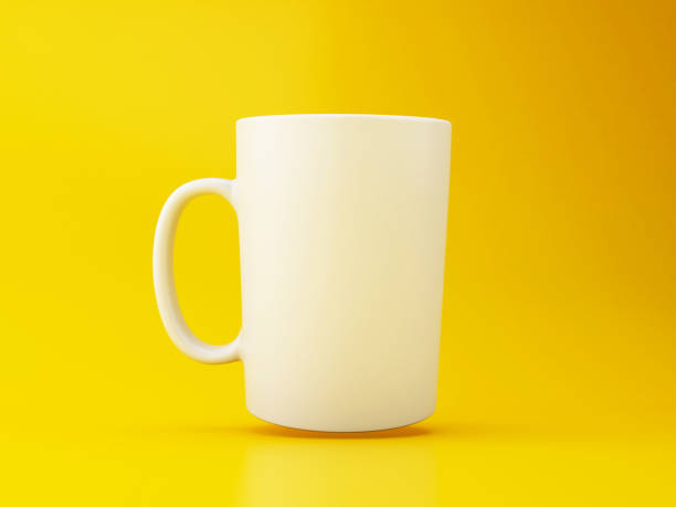 istock 3d White coffee mug on yellow background. 1152498869
