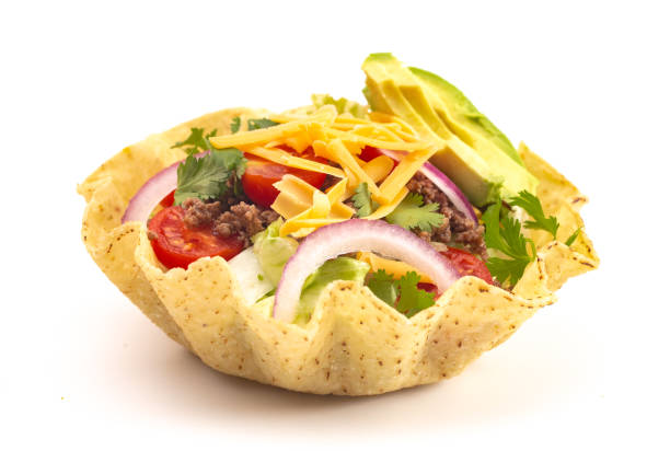 Taco Salad in a Crunch Corn Tortilla Bowl Isolated on a White Background