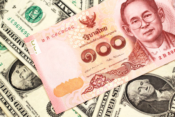 istock A Thai baht note with American one dollar bills 1152501278