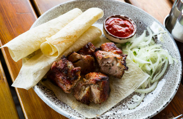 istock Oriental grilled pork meat shashlik 1152504818