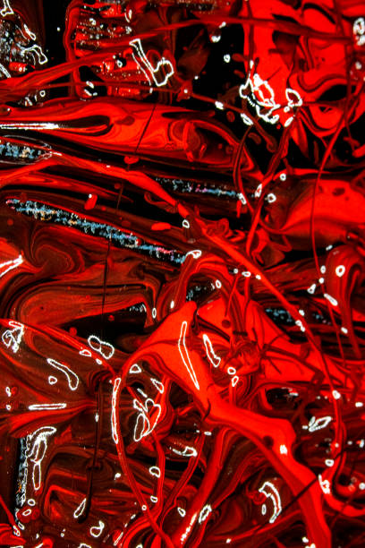 istock Red and Black Thick Paint Lines and Abstract Splatters on Canvas 1152505414
