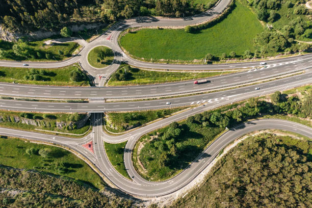 istock Highway, highway exits and crossroads as seen from above 1152509101