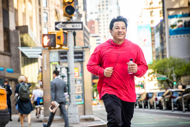istock Mature Hispanic Man Running in City 1152509122