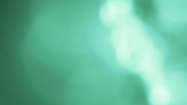 istock Abstract glowing particles background. Sparkling particles, bokeh and light effects. 1152510039