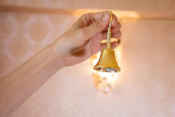istock gold bell symbol of religion 1152514524