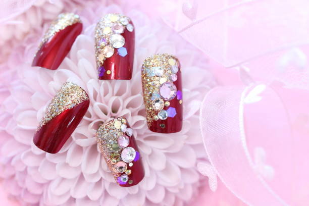 istock chrysanthemum and nail tip 1152517056