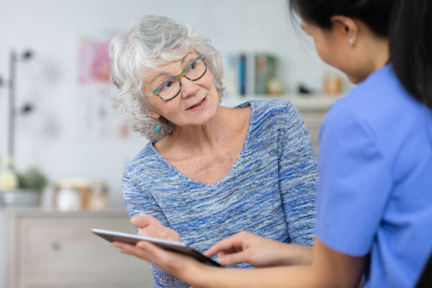 istock Senior woman at the doctors 1152517182