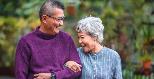 istock Smiling senior couple standing at back yard 1152517197