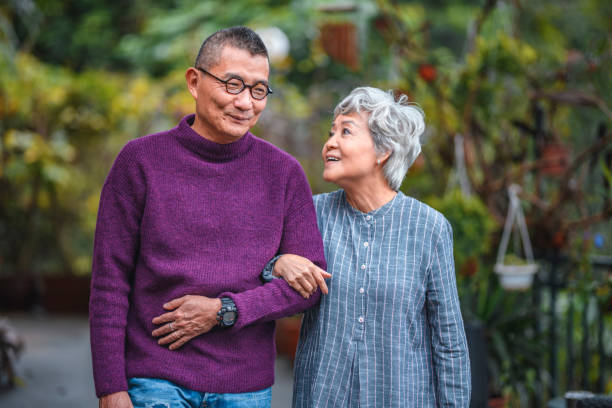 istock Smiling senior couple standing at back yard 1152517198
