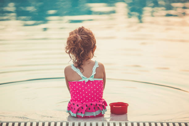 istock Sitting at the poolside and enjoying 1152517459