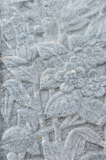 istock flower carving decorated on stone 1152517479