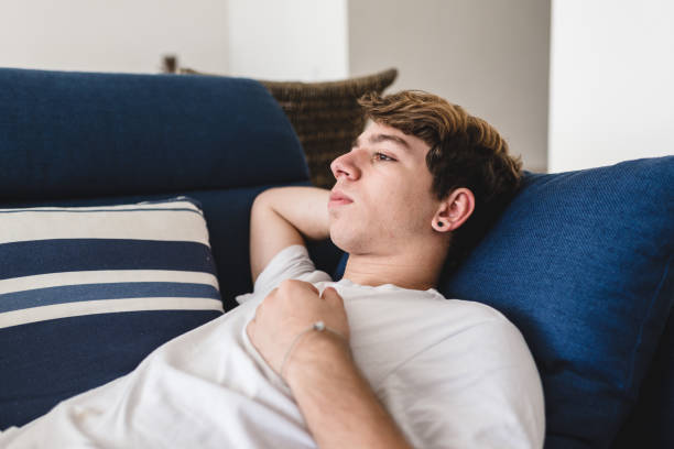 istock Teenager boy the on sofa 1152518412